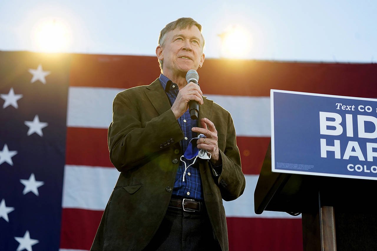 John Hickenlooper, Democratic candidate for the U.S. Senate seat in Colorado, speaks during a car rally for Doug Emhoff, husband of Democratic vice presidential candidate Kamala Harris, at East High School on Oct. 8. (AP Photo/David Zalubowski, File)