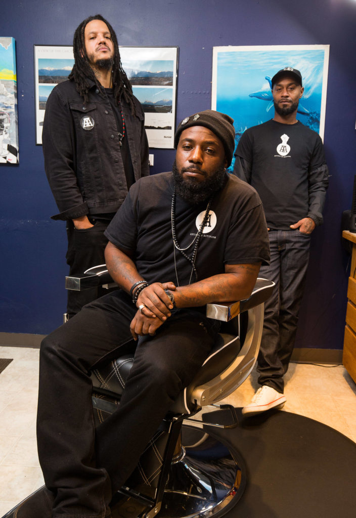 Elton Davis Sr., Jordan Jeffries and Chris Anderson have started an initiative, coined “Cops and Barbers,” is meant to foster honest conversations about race and policing between Black residents and Snohomish County sheriff’s deputies. (Andy Bronson / The Herald)
