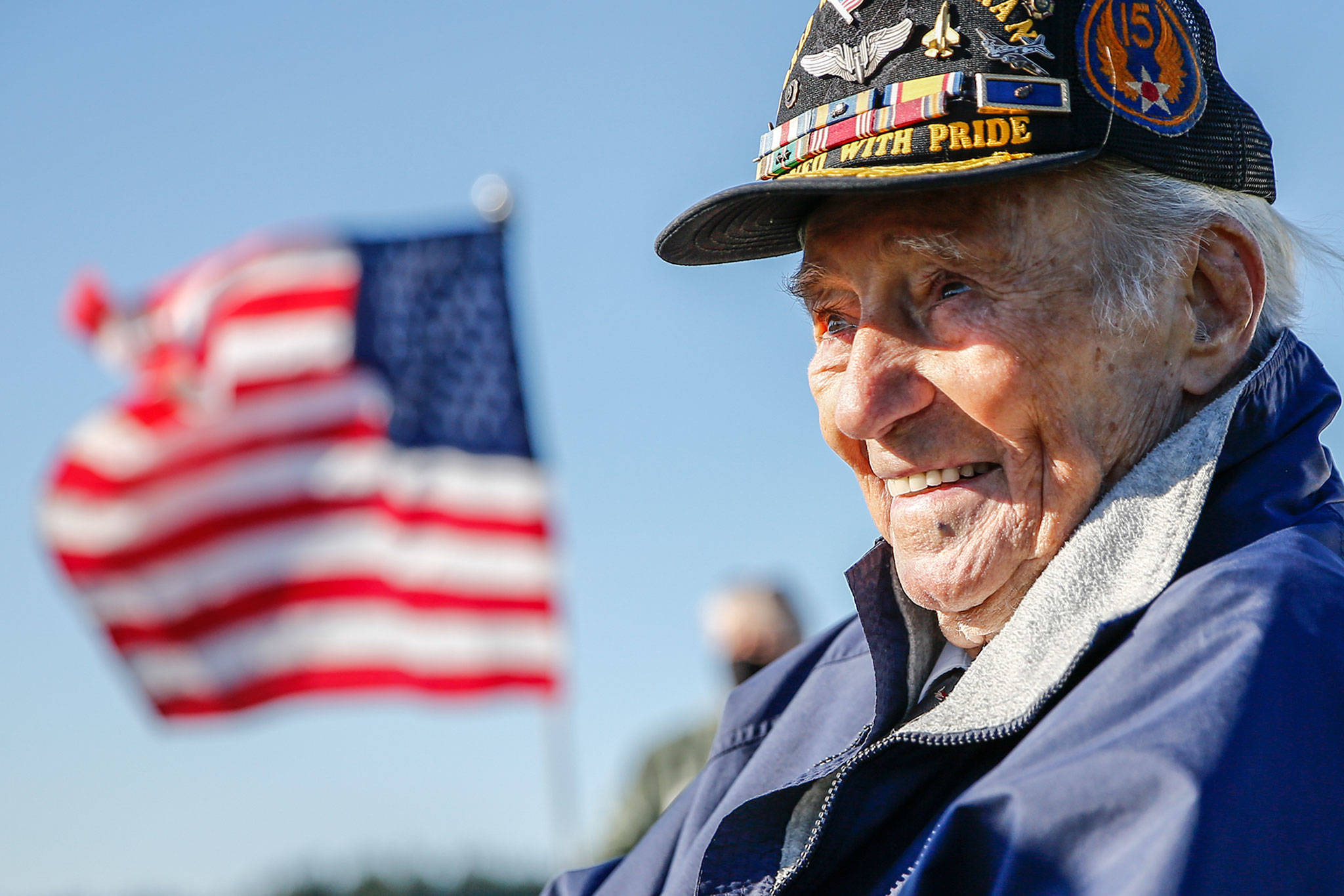 Art Unruh, World War II veteran, celebrates a couple days before his 98th birthday with a parade and vintage warplane flyover Sunday afternoon at the Arlington Airport. (Kevin Clark / The Herald)