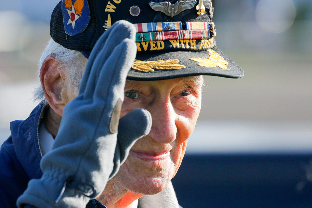 Art Unruh, World War II veteran, celebrates a couple days before his 98th birthday with a parade and vintage warplane flyover Sunday afternoon at the Arlington Airport. (Kevin Clark / The Herald)
