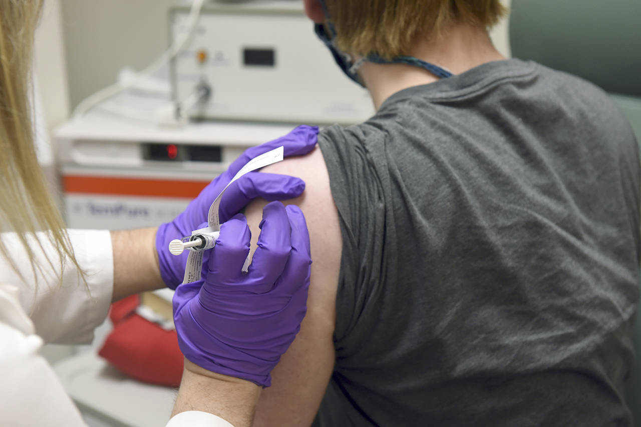 This May 4 photo shows the first patient enrolled in Pfizer’s COVID-19 coronavirus vaccine clinical trial at the University of Maryland School of Medicine in Baltimore. On Monday, Pfizer said an early peek at its vaccine data suggests the shots may be 90% effective at preventing COVID-19. (Courtesy of University of Maryland School of Medicine via AP, File)