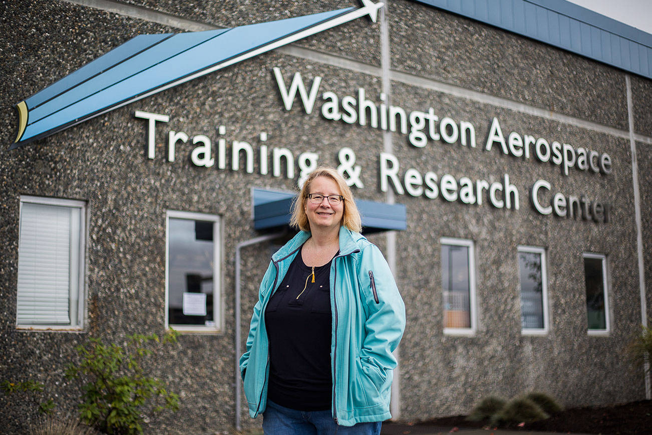 Melanie Evans outside of the Washington Aerospace Training & Research Center where she received her Quality Assurance Certificate on Wednesday, Nov. 4, 2020 in Everett, Wa. (Olivia Vanni / The Herald)