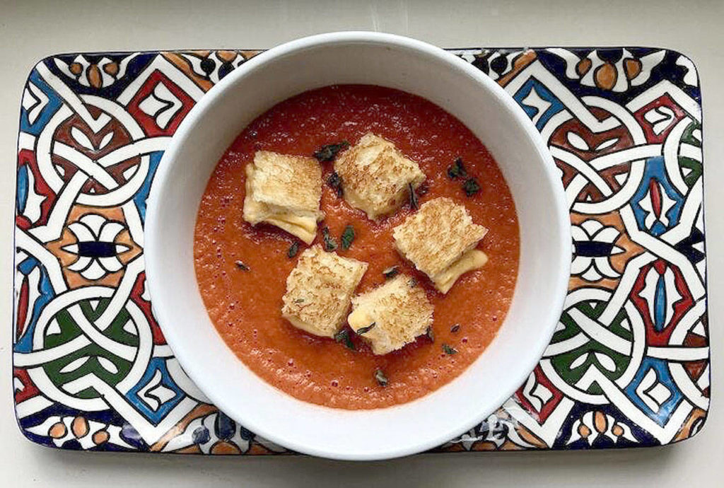 The croutons in this tomato soup are actually tiny grilled cheese sandwiches. (Rick Nelson / Star Tribune)
