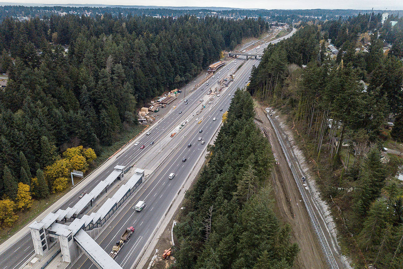 Cars drive along I-5 past Sound Transit construction that will result in I-5 closures starting Friday, Nov. 20 at 11 pm along southbound I-5 before 220th Street Southwest. (Olivia Vanni / The Herald)