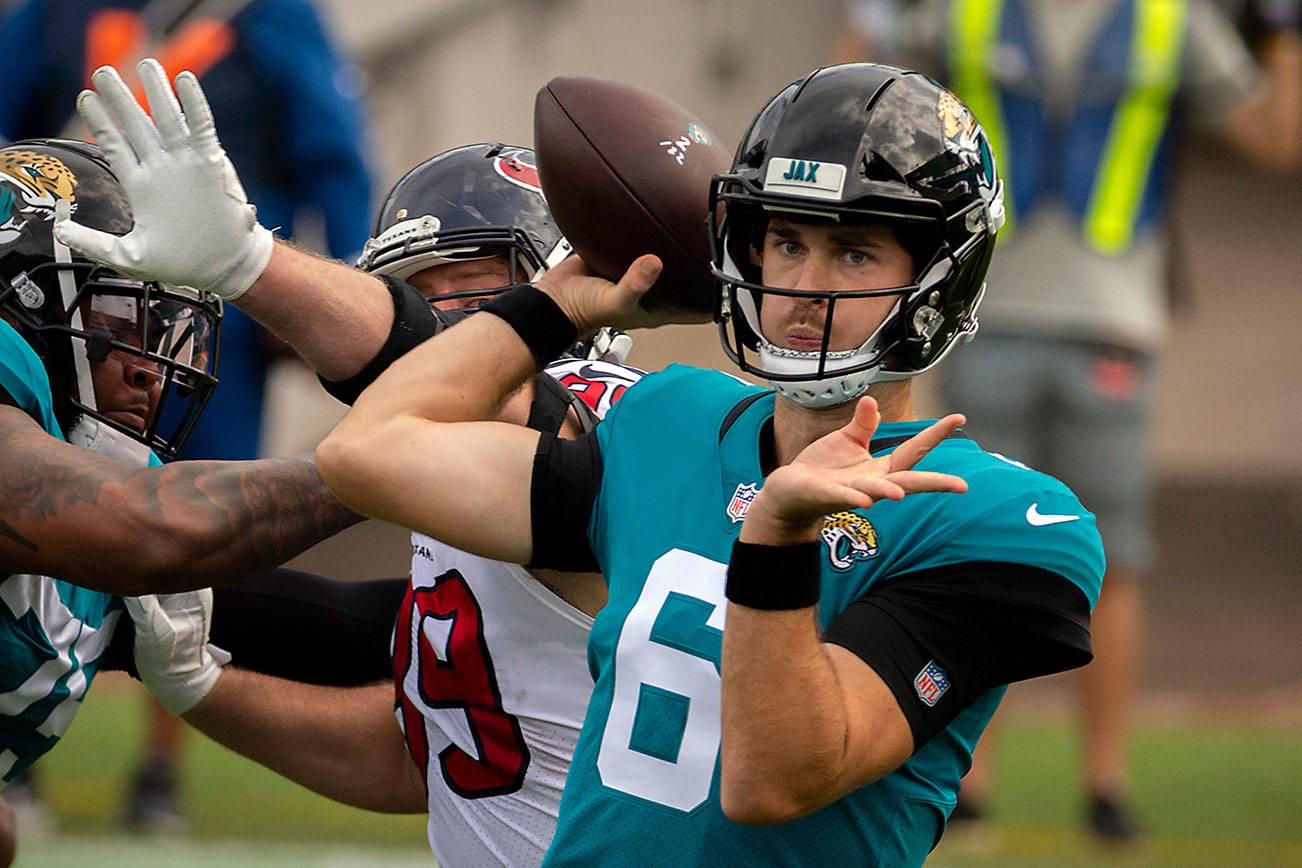 Jacksonville Jaguars quarterback Jake Luton (6) throws a pass against Houston Texans during the first half of an NFL football game, Sunday, Nov. 8, 2020, in Jacksonville, Fla. (AP Photo/Stephen B. Morton)