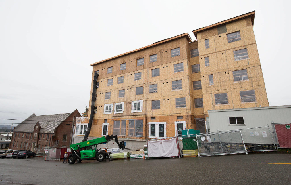 Construction continues on the new Compass Health project on 33rd Street on Nov. 18 in Everett. (Andy Bronson / The Herald)
