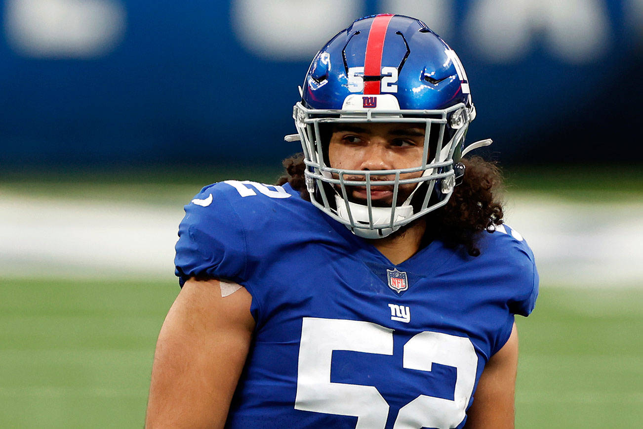 New York Giants linebacker Devante Downs (52) in action during an NFL football game against the Philadelphia Eagles, Sunday, Nov. 15, 2020, in East Rutherford, N.J. (AP Photo/Adam Hunger)