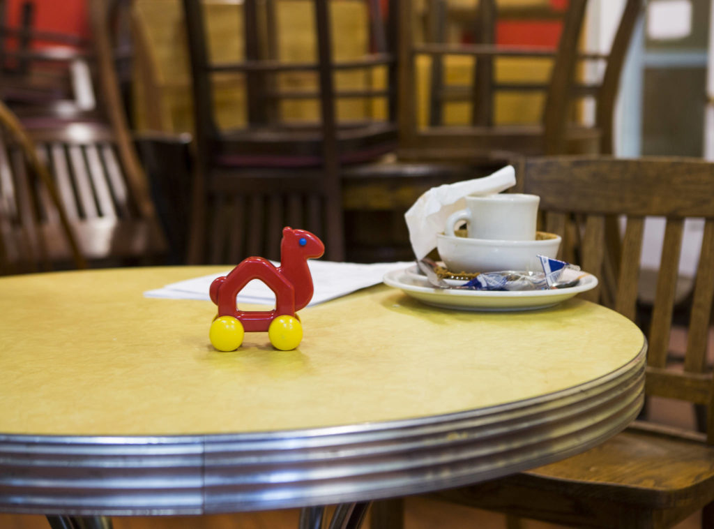 A small toy used as a order identifier sits on an table at Sisters on Tuesday in Everett. (Olivia Vanni / The Herald)
