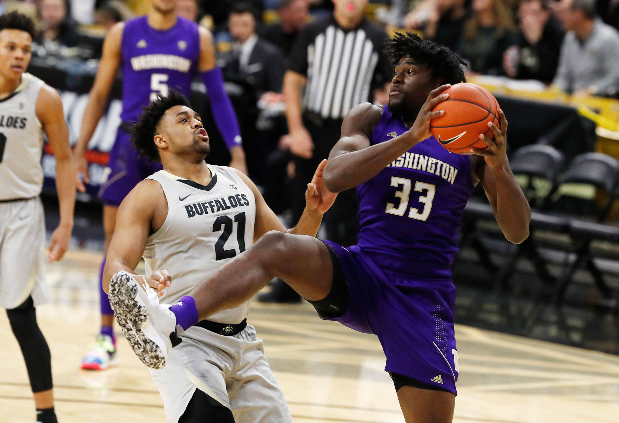 Washington forward Isaiah Stewart (right), pulls in a rebound as Colorado forward Evan Battey defends during the first half of a game Jan. 25, 2020, in Boulder, Colo. (AP Photo/David Zalubowski)