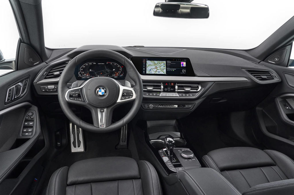 The M235i Gran Coupe interior uses upscale materials and BMW’s typical design with controls grouped together and geared toward the driver for ease of use. (Manufacturer photo)
