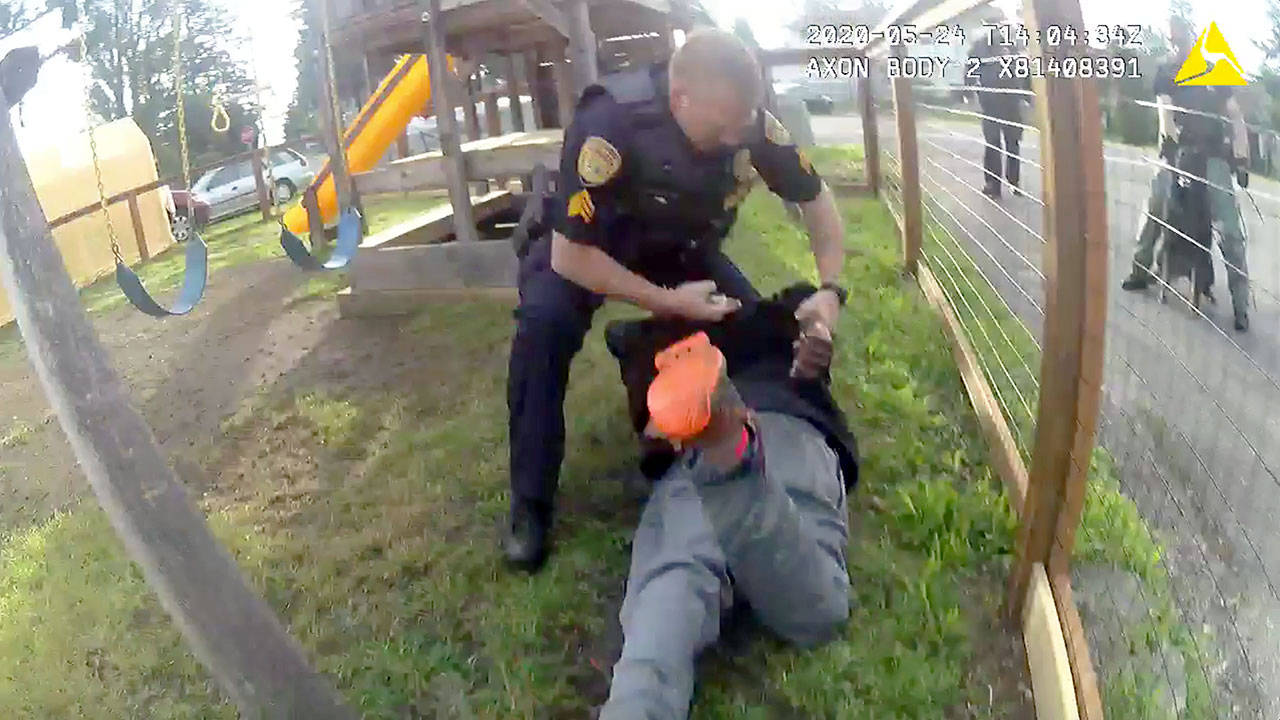 A body camera captured this image of an Everett police sergeant making an arrest May 24. The incident led to a clarification of department policy. (Everett Police Department, file)