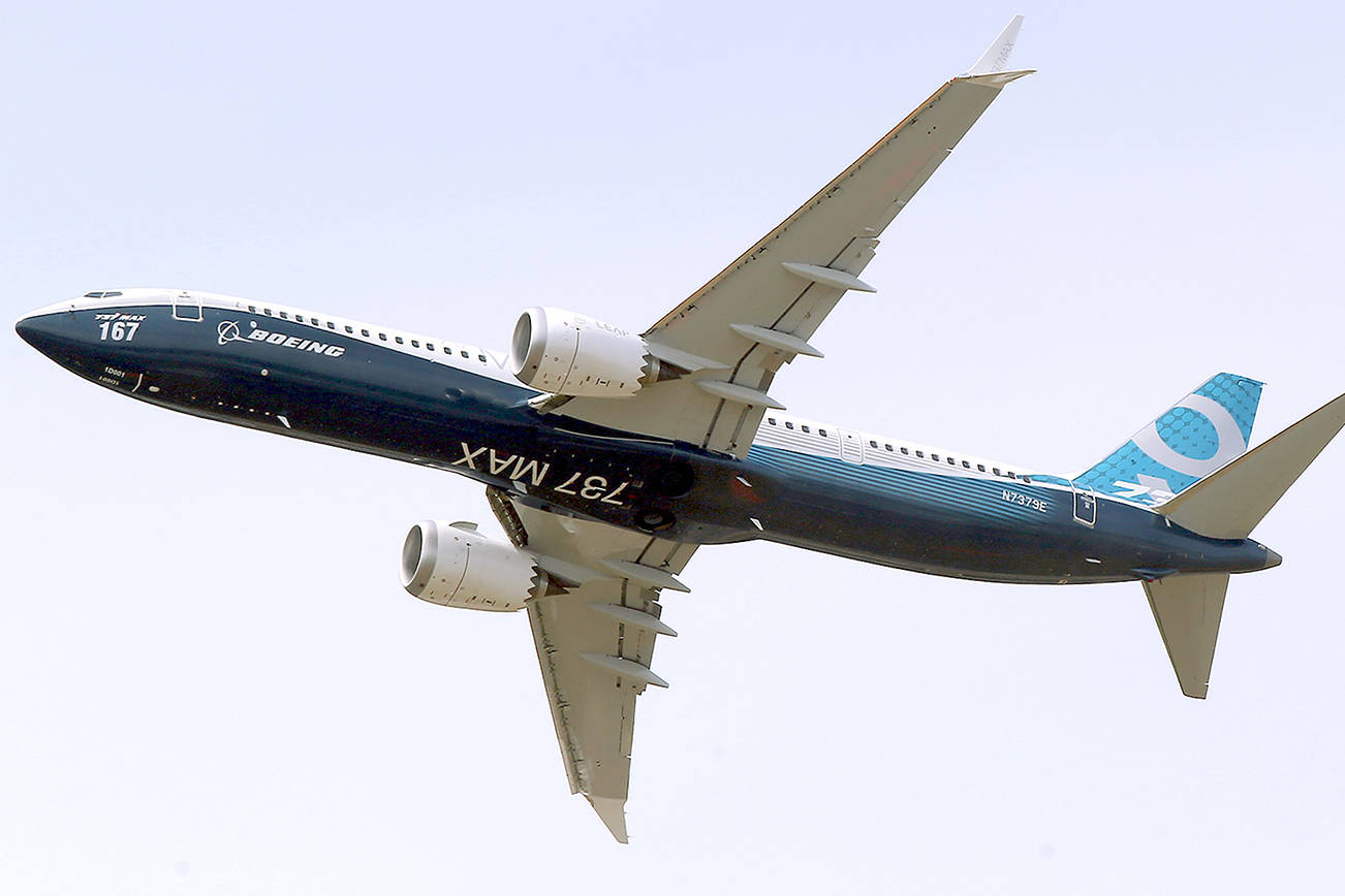 FILE - In this Tuesday, June 20, 2017 file photo a Boing 737 MAX 9 airplane performs a demonstration flight at the Paris Air Show, in Le Bourget, east of Paris, France. Europe’s aviation regulator has taken a step closer to letting the Boeing 737 Max fly again. It published a proposed airworthiness directive on Tuesday that could see it clear the aircraft within weeks to resume flying after nearly two years and a pair of deadly crashes. (AP Photo/Michel Euler, file)
