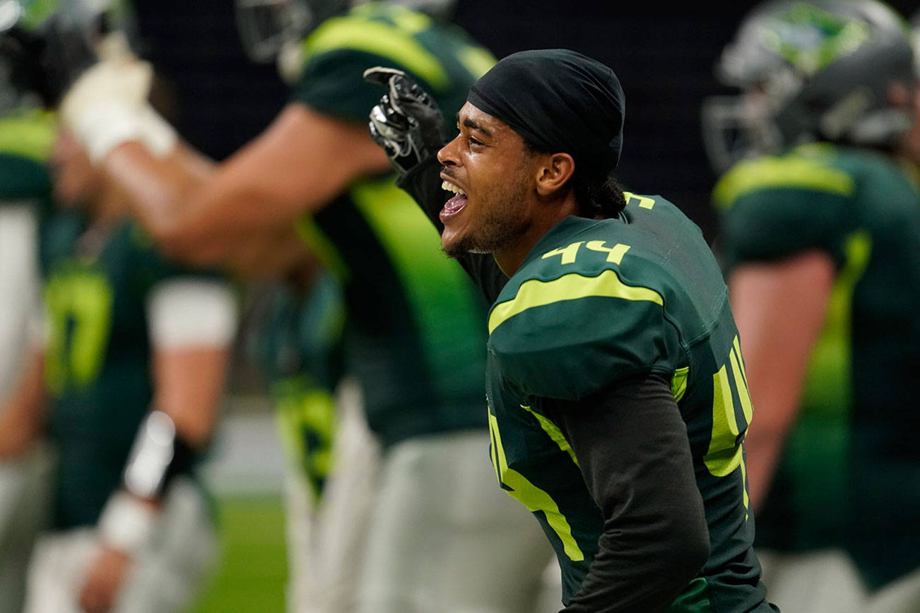 Alphas defensive back Austin Joyner (44), a Marysville Pilchuck graduate, encourages teammates during a Spring League game. (Cooper Neill / The Spring League)