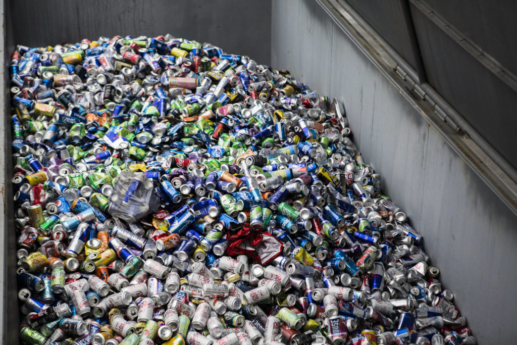 Aluminum cans fill a large recycling container at the Airport Road Recycling & Transfer Station on Nov. 24 in Everett. (Olivia Vanni / The Herald)
