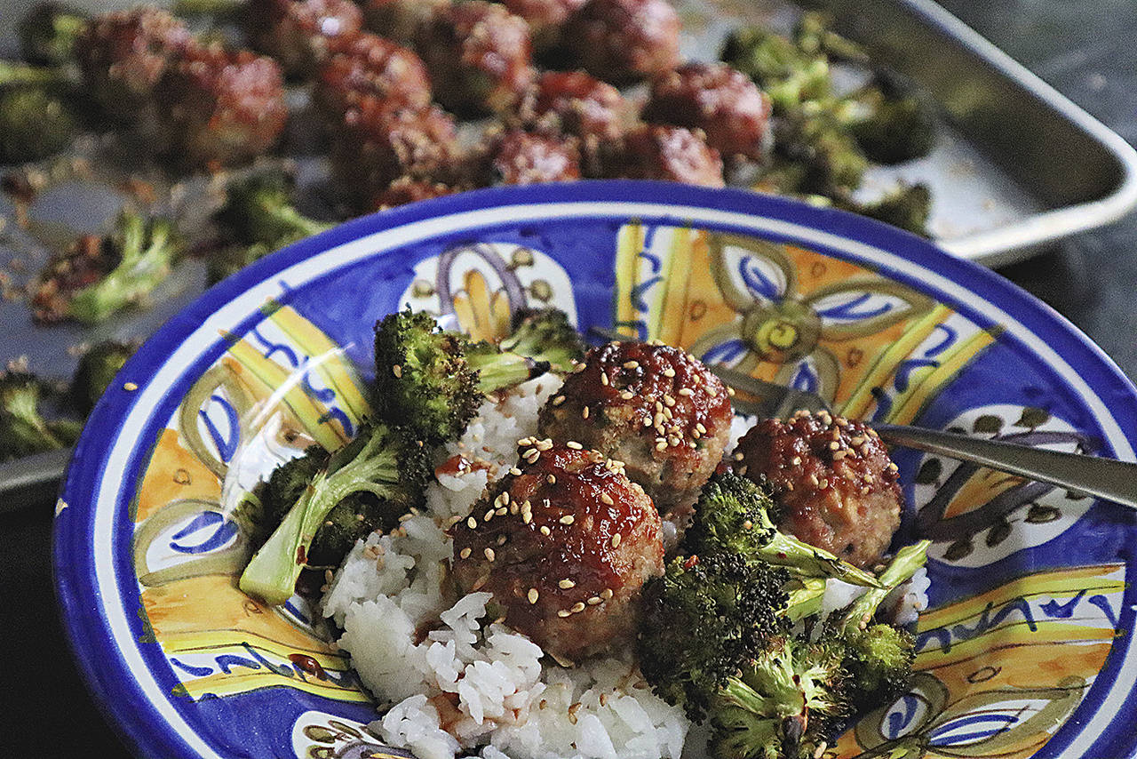A sheet-pan dinner of meatballs and broccoli comes together in short time, with no mess. (Gretchen McKay / Pittsburgh Post-Gazette)