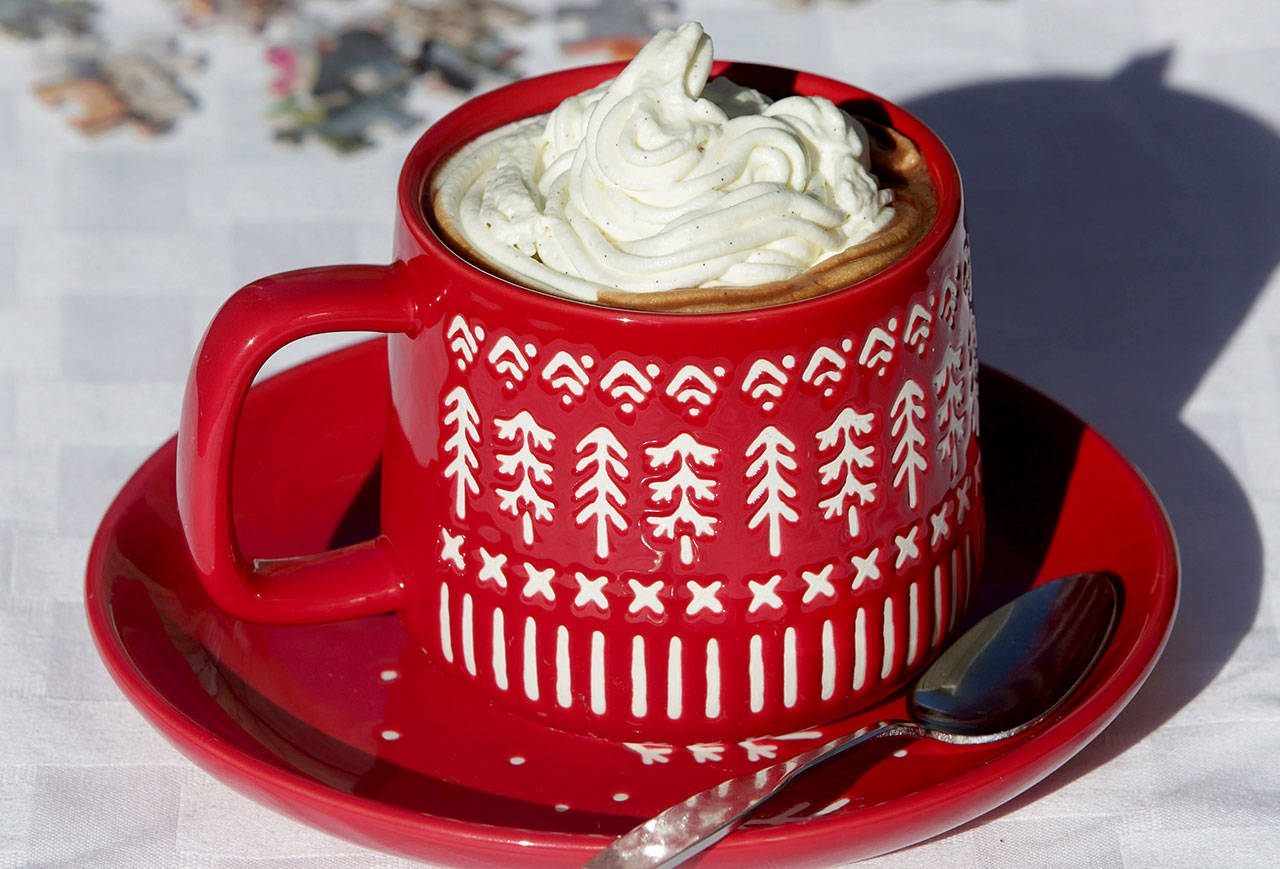 A cup of Parisian hot chocolate is topped with Chantilly cream. (Hillary Levin / St. Louis Post-Dispatch)