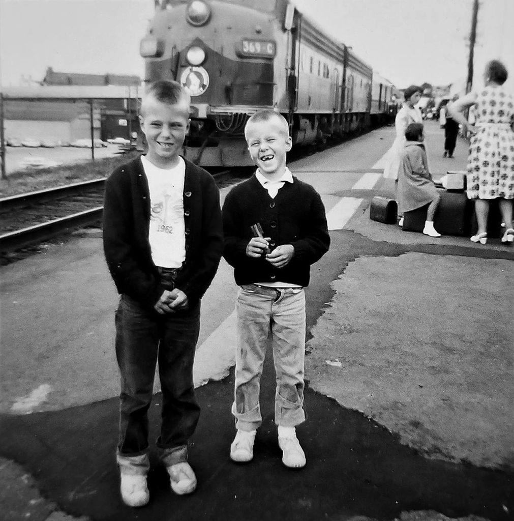 Neil Anderson (left) and his younger brother Edward Anderson in about 1963 outside the Everett depot on Bond Street. Anderson presented an online Historic Everett program this week focused on growing up in a city shaped by railroads. (Courtesy Neil Anderson)
