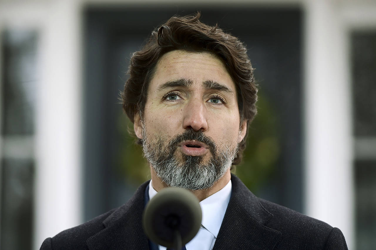 Prime Minister Justin Trudeau holds a press conference at Rideau Cottage during the COVID pandemic in Ottawa on Tuesday. (Sean Kilpatrick/The Canadian Press via AP)