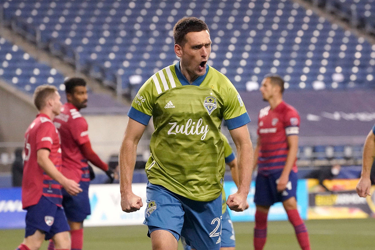 Seattle Sounders' Shane O'Neill reacts after scoring against FC Dallas during the second half of an MLS playoff soccer match Tuesday, Dec. 1, 2020, in Seattle. (AP Photo/Ted S. Warren)