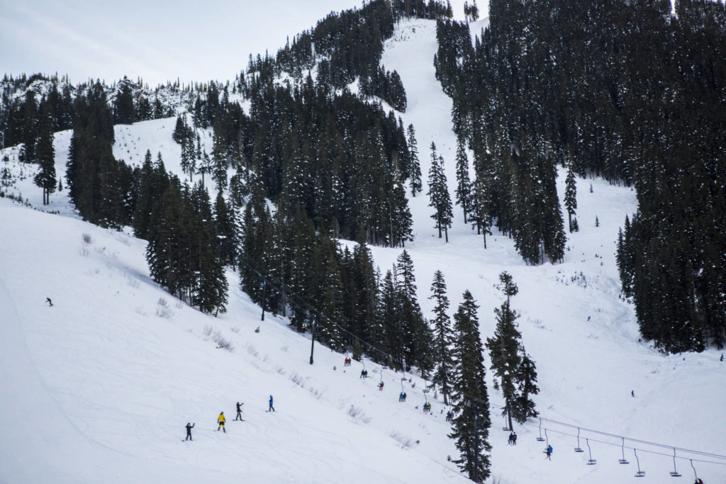 People make their way up and down the mountain at Stevens Pass last Friday. (Olivia Vanni / The Herald)
