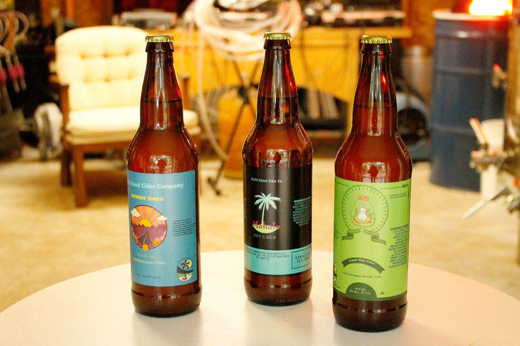 Misfit Island Cider Co.’s Sunny Days, Mahalo and Cider Hoppins dry ciders are available in bottles. (Kira Erickson / South Whidbey Record)
