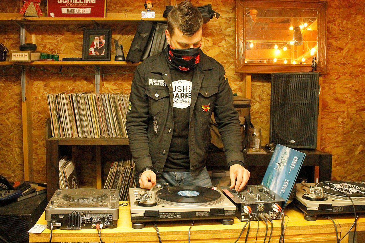 Christopher “CJ” Powell, co-owner and head cider maker of Misfit Island Cider Co., fell in love with English dry cider while deejaying in London. (Kira Erickson / South Whidbey Record)