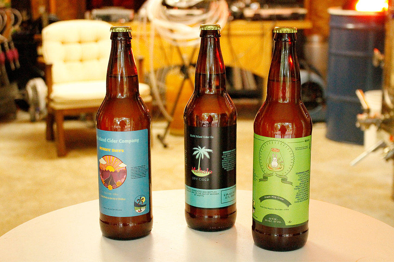 Misfit Island Cider Co.'s Sunny Days, Mahalo and Cider Hoppins dry ciders are available in bottles. (Kira Erickson / South Whidbey Record)