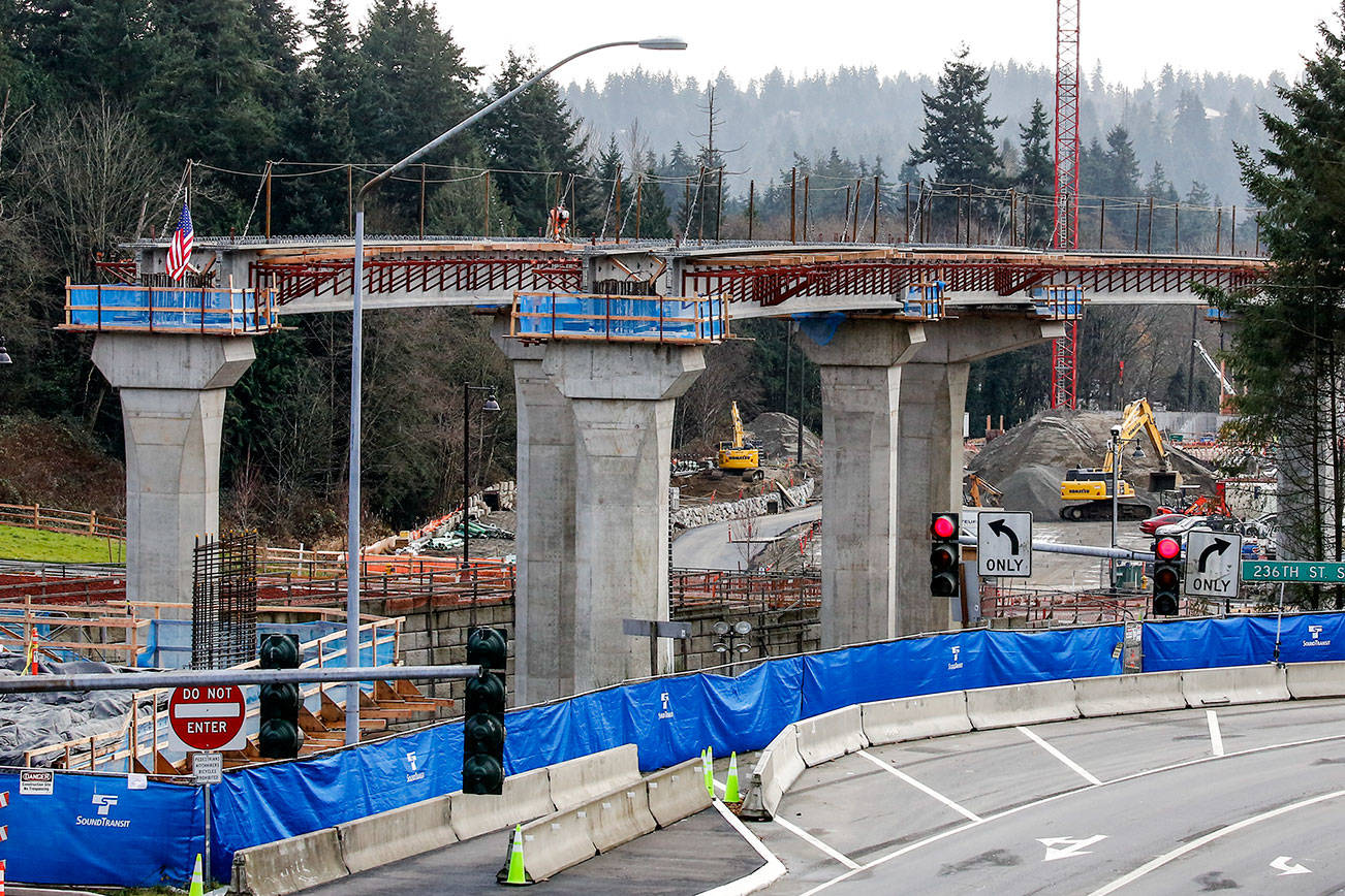 Construction continues in Mountlake Terrace on the light rail extention Friday afternoon on December 11, 2020. Sound Transit is re-evaluating its ST3 projects' timelines based on projections for vastly reduced revenue in the coming years.  (Kevin Clark / The Herald)