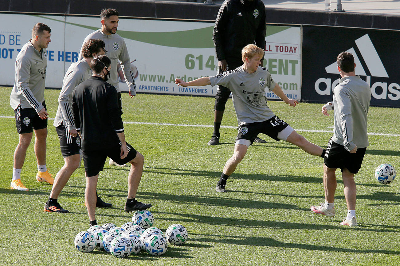 Seattle Sounders midfielder Ethan Dobbelaere (45) kicks a ball around during a practice session in Columbus, Ohio on Friday, Dec. 11, 2020, before Saturday's MLS Cup against Columbus Crew SC. (Barbara J. Perenic/The Columbus Dispatch via AP)