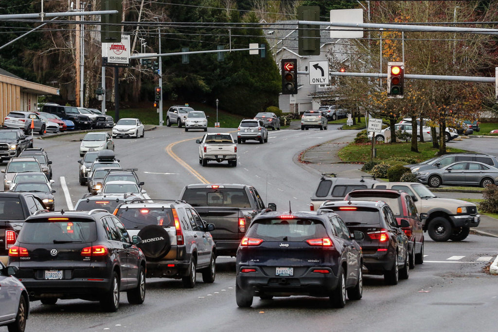 The signage eastbound on 168th Street SW as you approach Highway 99 is confusing and leads to people in the center lane illegally turning left. Lynnwood’s traffic engineer said it’s all up to standards and code. (Kevin Clark / The Herald)
