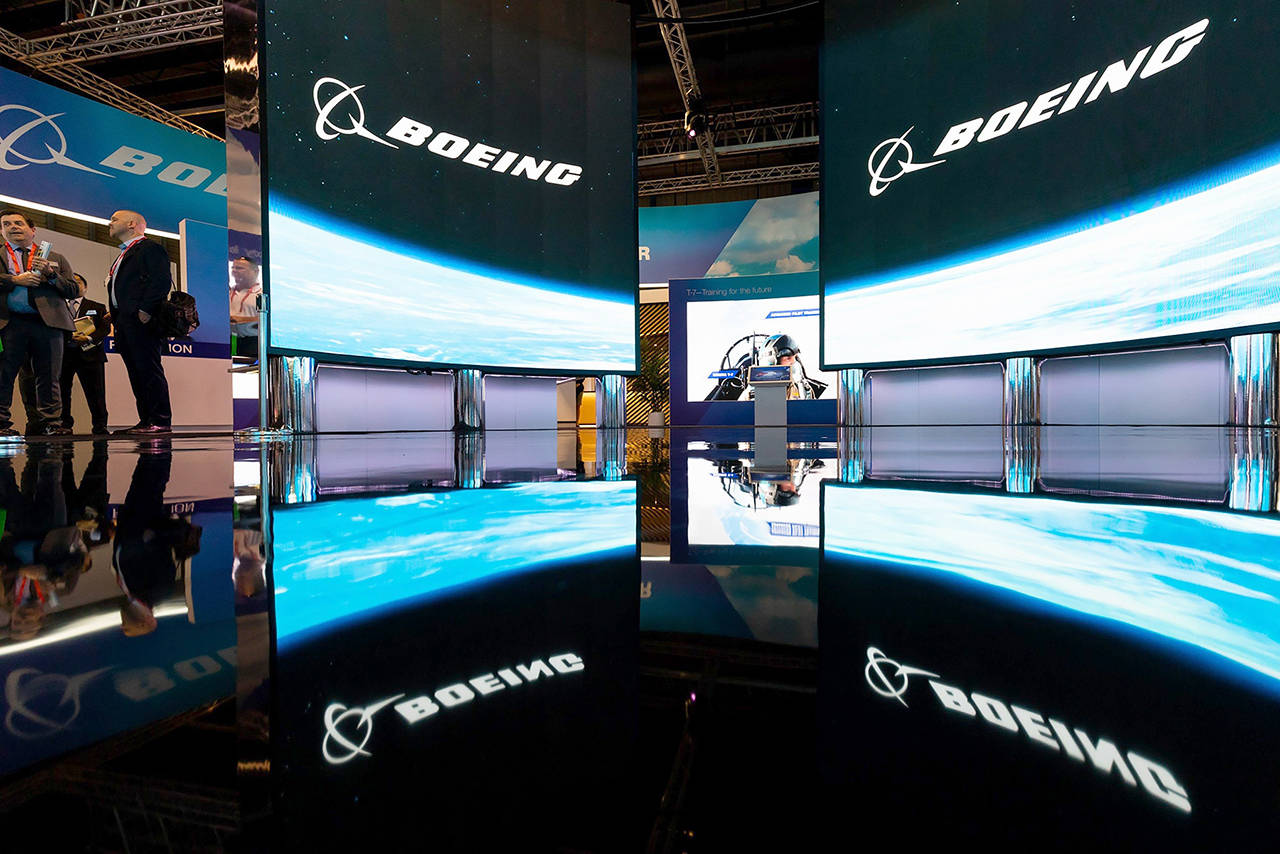 Boeing logos are displayed at the company’s booth during the Singapore Airshow in Singapore on Feb. 12. (SeongJoon Cho/Bloomberg, file)