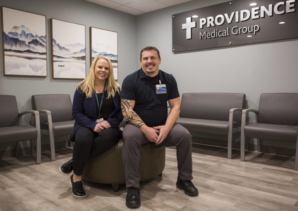 Laura Knapp (left), director of behavioral health, and counselor Jordan Larkin-Sinn (right) inside the new Behavioral Health Urgent Care Unit at Providence Regional Medical Center Everett. (Olivia Vanni / Herald file)
