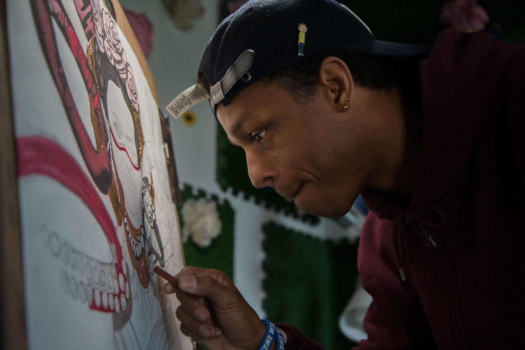 Julius Wilson’s artwork can be seen at Zoey’s Fried Chicken Sandwiches on Casino Road in south Everett. (Andy Bronson / The Herald)
