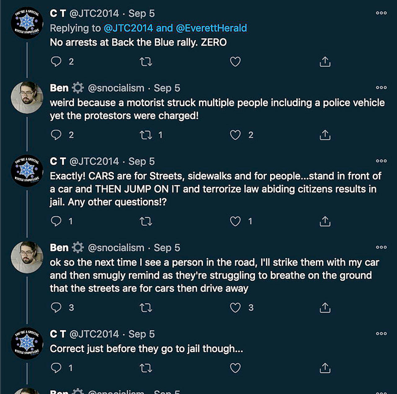 An exchange between the Twitter account @JTC2014 and another user. @JTC2014 was believed to be Everett Police Sgt. James Collier. But Collier told investigators that his son had been using the account. (Twitter)