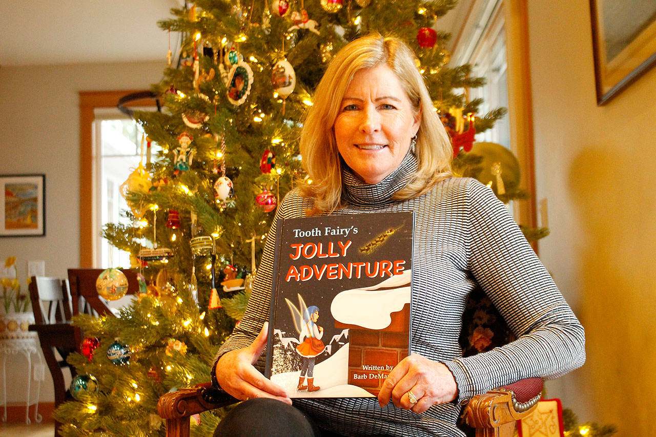 Langley author Barb DeMartino’s children’s book “Tooth Fairy’s Jolly Adventure” — in which the Tooth Fairy meets Santa Claus — was published just in time for Christmas. The story was inspired by DeMartino’s 6-year-old grandson, who lost a tooth on Christmas Eve last year. (Kira Erickson / South Whidbey Record)