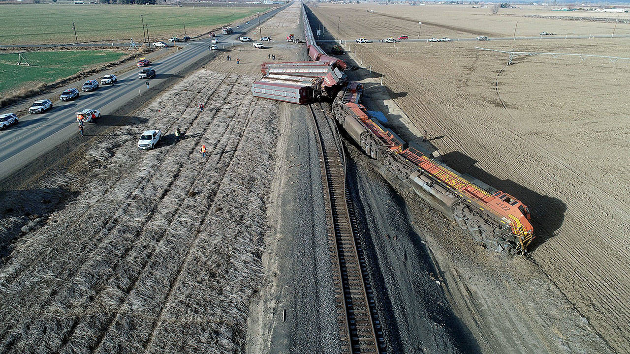 Three locomotives and eight empty grain cars derailed near Mabton after colliding with a truck on Wednesday. (Washington State Patrol)