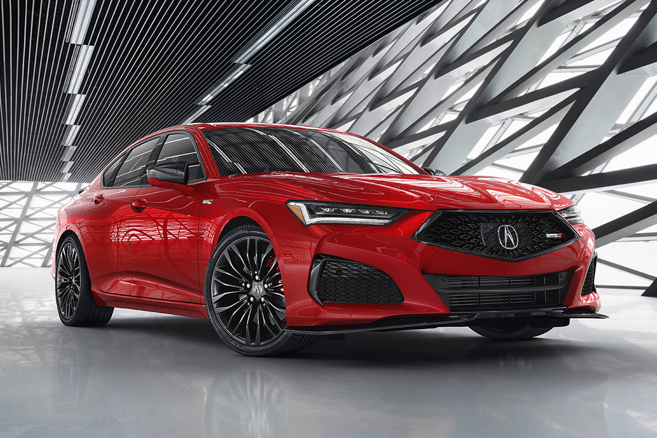 An expansive hood, tapered roofline, and sharp angles are focal points of the 2021 Acura TLX. The A-Spec version is shown here. (Manufacturer photo)