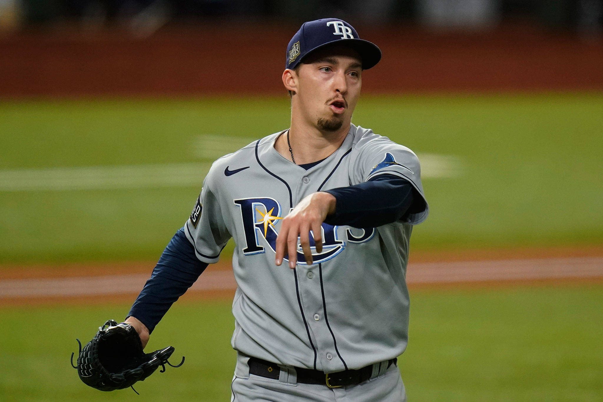Rays starting pitcher Blake Snell celebrates the end of the fifth inning against the Los Angeles Dodgers in Game 6 of the World Series on Oct. 27, 2020, in Arlington, Texas. Snell, a Shorewood High School alum, was traded to the Padres on Tuesday. (AP Photo/Eric Gay)