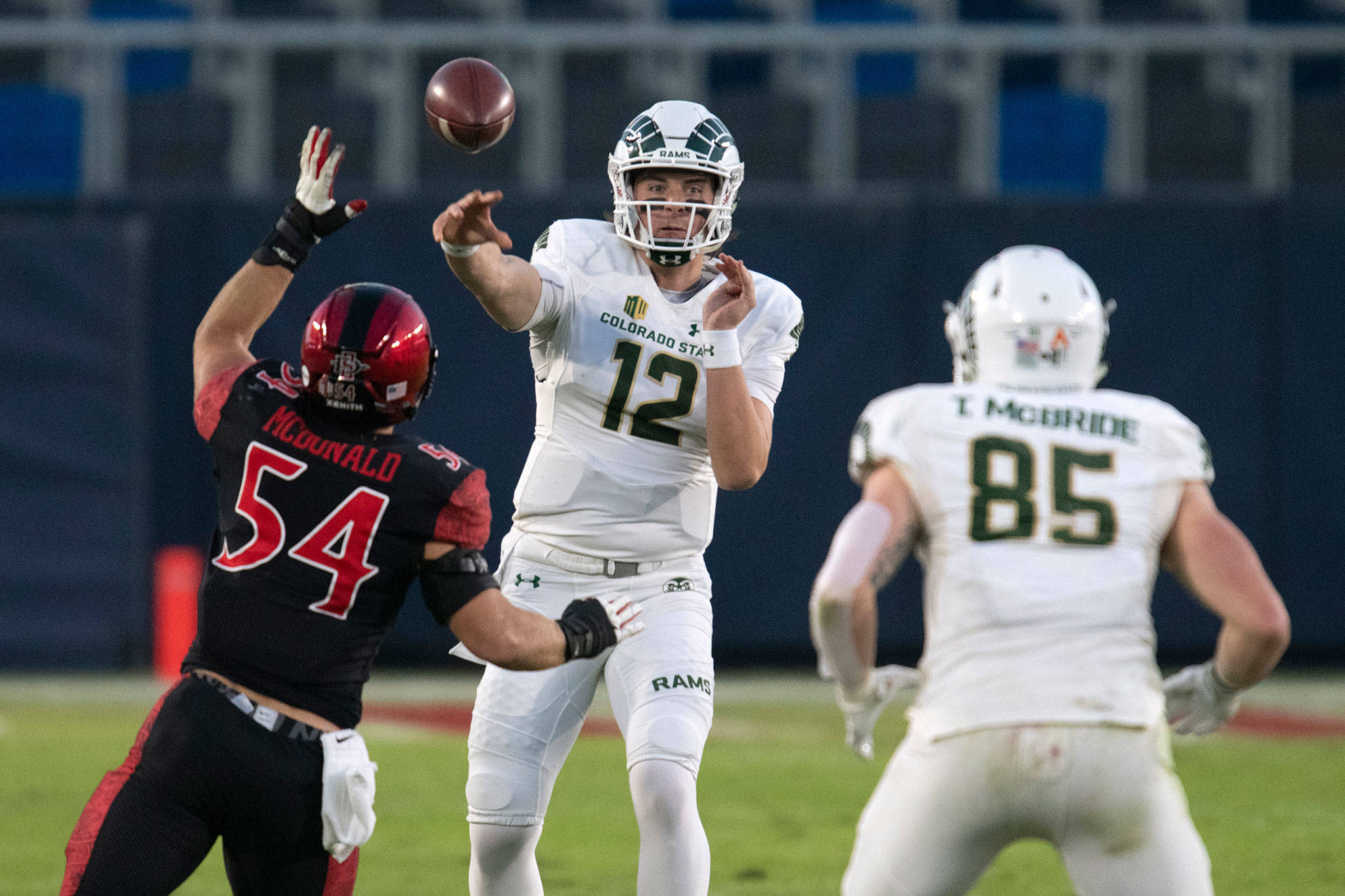Colorado State quarterback Patrick O’Brien (12) passes to tight end Trey McBride (85) over San Diego State linebacker Caden McDonald (54) during a game on Dec. 5, 2020, in Carson, Calif. (AP Photo/Kyusung Gong)