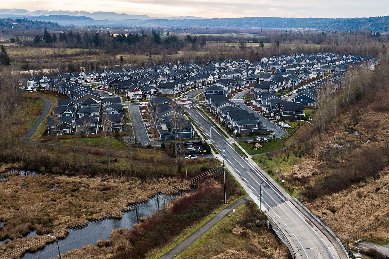 The Riverfront Development sits just south of the remains of the Everett landfill. New development will soon cover nearly all the 70-acre former landfill. Photo taken on Tuesday, Dec. 29, 2020 in Everett, Wa. (Olivia Vanni / The Herald)