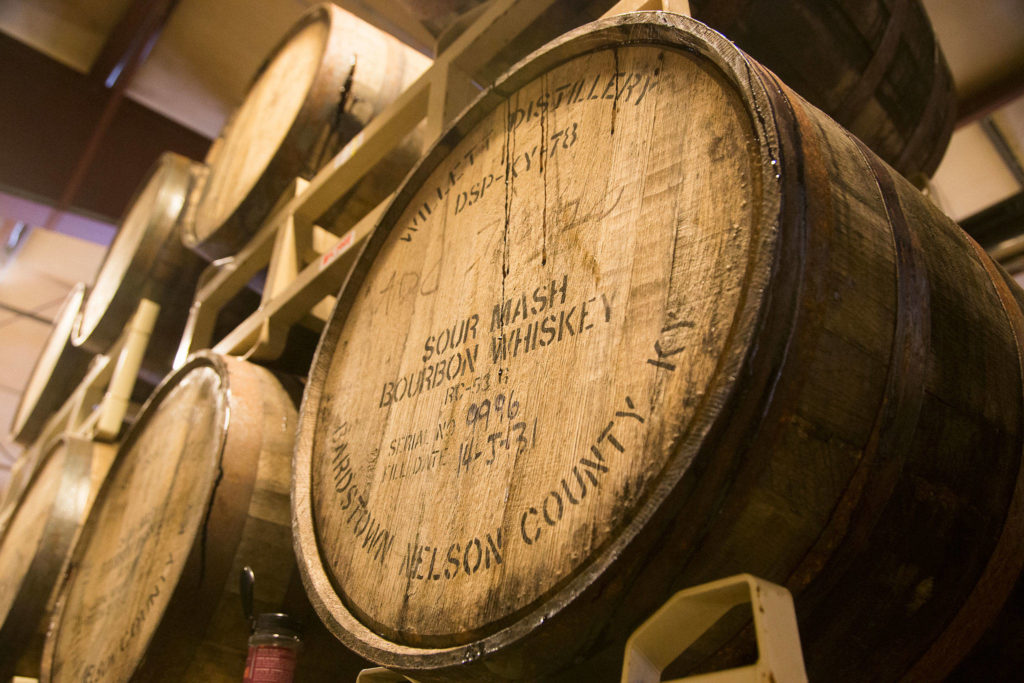Barrels with stamps from the original users at Skookum Brewery in Arlington. (Andy Bronson / The Herald)
