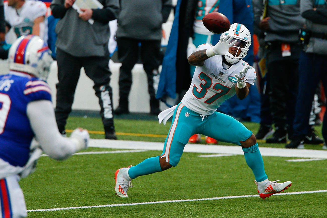 Miami Dolphins running back Myles Gaskin (37) catches a pass in the first half of an NFL football game against the Buffalo Bills, Sunday, Jan. 3, 2021, in Orchard Park, N.Y. (AP Photo/John Munson)