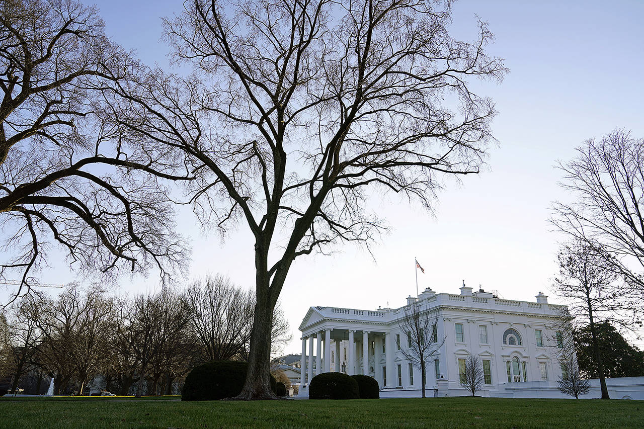 An American flag flies over the White House in Washington on Thursday. (AP Photo/Patrick Semansky)