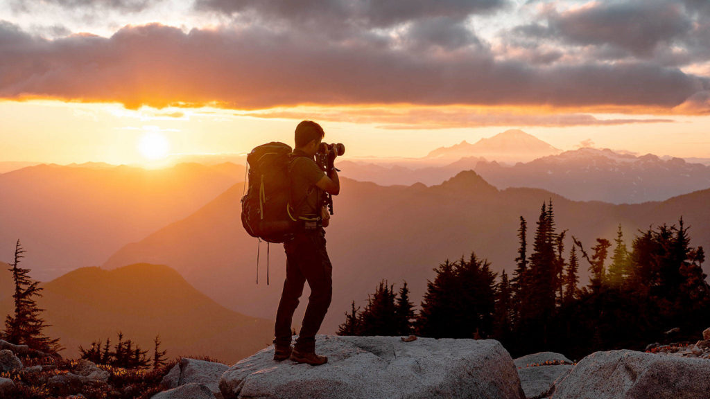 First place, Hikers in Action: This photo by John Duong of a photographer in action at Hidden Lake Lookout won top honors in the Hikers in Action category.
