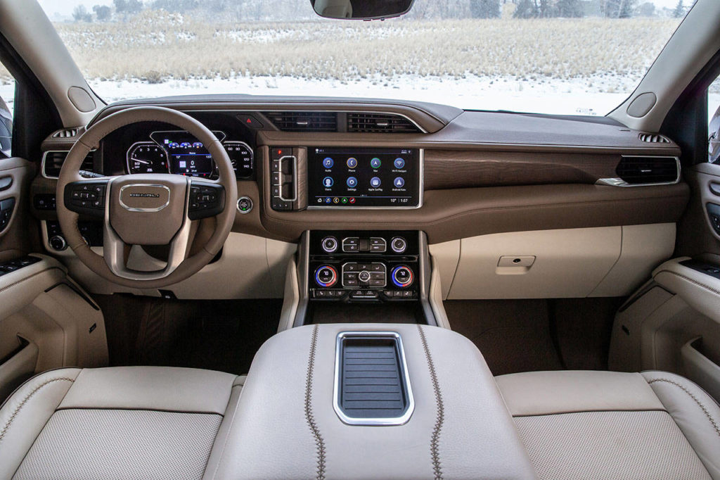The 2021 GMC Yukon Denali’s exclusive interior includes authentic wood trim and hand stitched seats. (Manufacturer photo)
