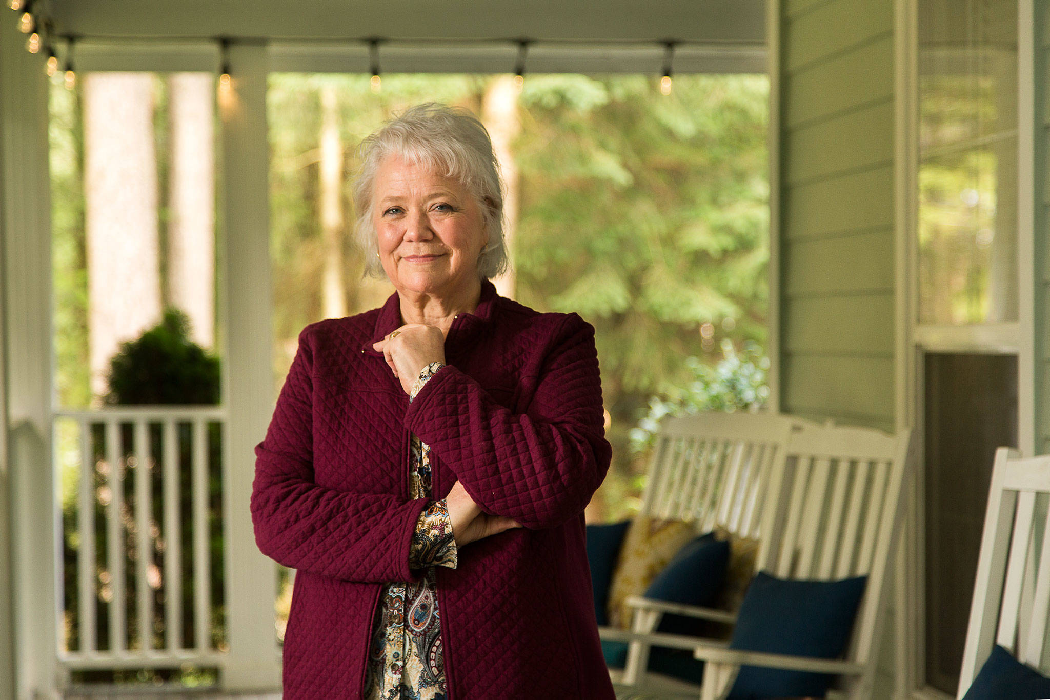 Peggy Jahn at her home Thursday in Marysville. Jahn recovered from COVID-19, spending three weeks on a ventilator, and now walks 10,000 steps a day. She was one of Snohomish County’s early cases. Admitted March 14, she spent 42 days at Providence Regional Medical Center Everett. (Andy Bronson / The Herald)