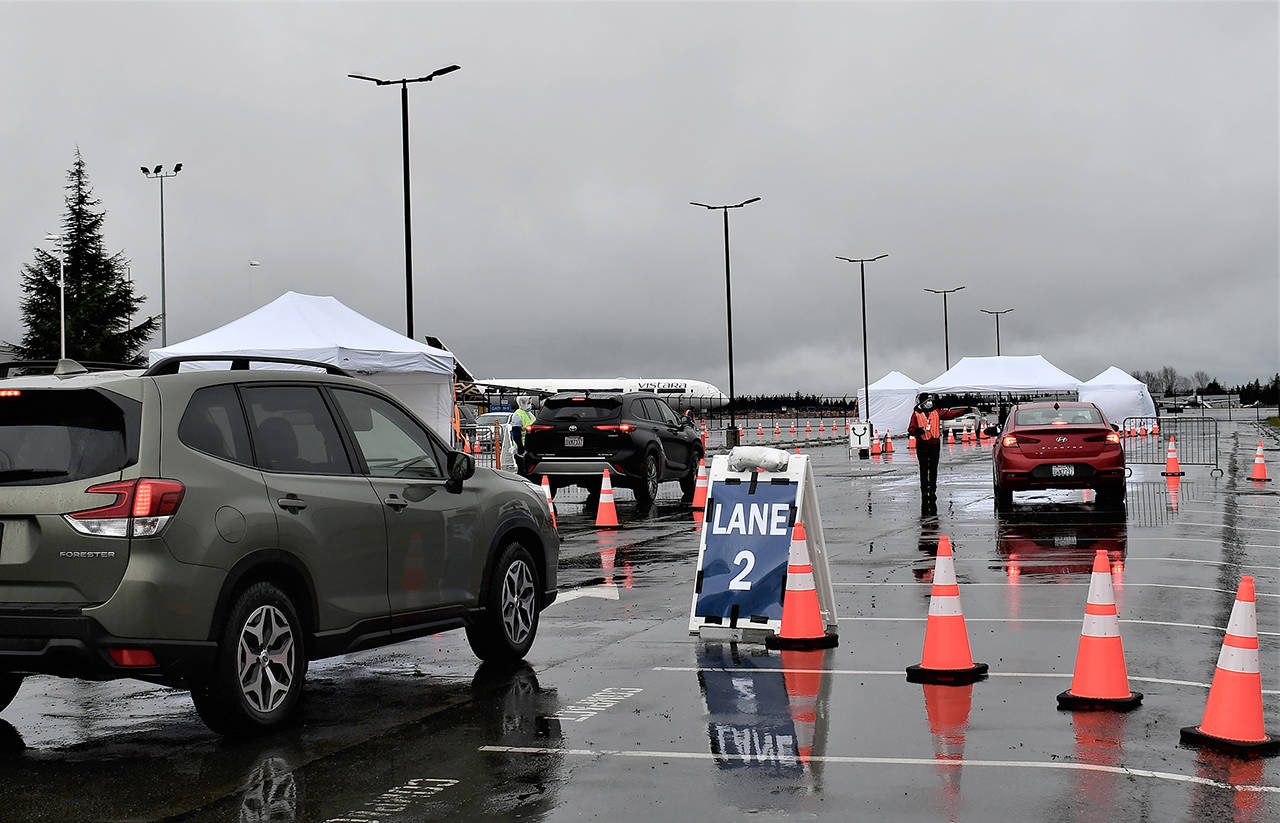 People line up for COVID-19 vaccinations at Paine Field in Everett. (Snohomish County Emergency Coordination Center)