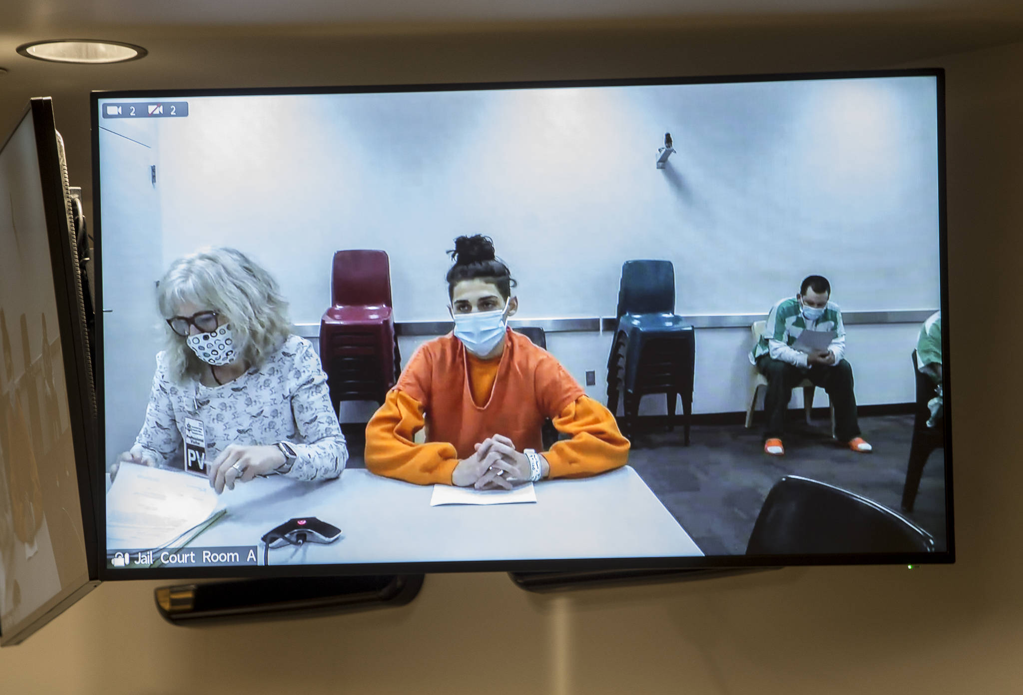 Dominic Wilson, one of the two teen suspects charged as adults in the murder of Andre Hofland, appears over video at his arraignment at the Snohomish County Courthouse on Tuesday in Everett. (Olivia Vanni / The Herald)