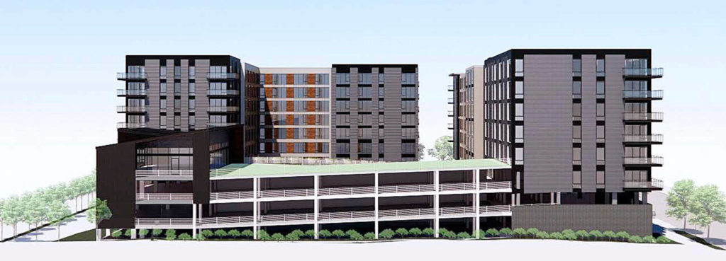 Trent Development’s planned apartment complex in the Lynnwood City Center would include two L-shaped buildings for housing and street-level retail, and a rectangular parking structure with 265 spaces. (Trent Development)
