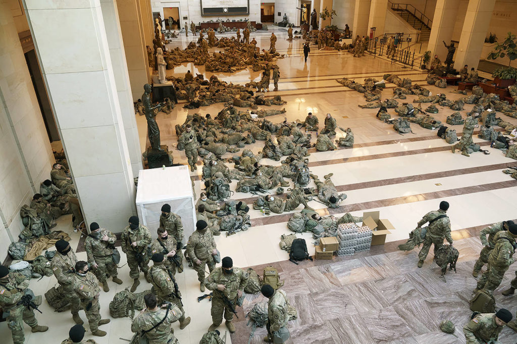 Hundreds of National Guard troops hold inside the Capitol Visitor’s Center to reinforce security at the Capitol in Washington D.C. on Wednesday. (AP Photo/J. Scott Applewhite)
